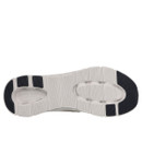 The image shows the sole of a shoe with a white textured surface and black rectangular grips on the heel and toe, conveying durability and traction.