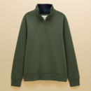 Green men’s quarter-zip fleece laid flat, featuring a high collar and subtle embroidered logo on the chest.