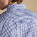Back view close-up of blue and white gingham shirt showing collar and Joules branded tab on the yoke.
