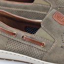 Close-up of the green loafer showing perforated leather, stitching and brown lace-style side detail.