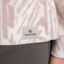Close-up of the Craghoppers logo patch stitched onto a pale pink patterned fleece hem.