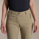 Close-up of khaki cropped trousers waistband with button fastening and zip fly.