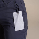 Close-up of navy women’s walking trousers showing hanging Craghoppers glasses wipe tag.