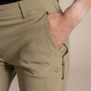 Close-up of side pocket on khaki shorts with zippered security pocket and Craghoppers logo.