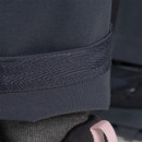 Close-up of the textured inner ankle cuff on dark grey Craghoppers trousers, showing grip detail at hem.
