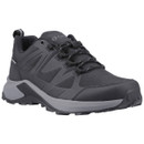 A black outdoor hiking shoe with a rugged design, featuring a thick grey sole and lace-up front. The shoe looks sturdy, designed for rough terrains.