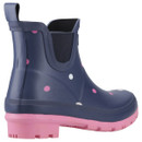 Navy blue rain boot with pink and white polka dots, featuring pink soles and pull tabs. The playful design creates a cheerful, rain-ready vibe.