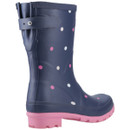 A navy blue rubber boot with white and pink polka dots, featuring a pink sole and an adjustable strap near the top, viewed from the side.