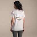 Back view of women’s off-white Craghoppers x National Trust T-shirt showing large circular coastal landscape graphic print.