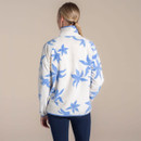 Back view of an off-white women’s half-zip fleece with blue floral pattern and high neck, studio shot.