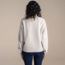 Back view of an off-white sherpa fleece pullover with pale blue trim, shown on a model.