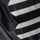 Detail of the black-and-silver striped side panel on a FlyGuard Pro horse fly mask.