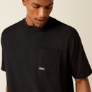 Close-up of the black T-shirt’s chest pocket with a small Ariat label tag.