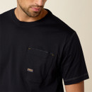 Close-up of the black T-shirt’s chest pocket with reinforced stitching and an Ariat label tag.