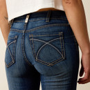 Close-up of the back of the jeans showing stitched back pockets and Ariat waistband label.