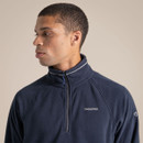 Close-up of a male model wearing the navy Craghoppers half-zip fleece, highlighting the collar, zip and chest logo.