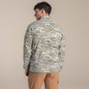 Rear view of a model wearing the olive and cream patterned half-zip fleece.