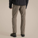 Back view of a model wearing pebble-coloured walking trousers.