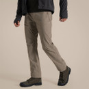Model wearing pebble-coloured walking trousers, shown in side view with outdoor boots.