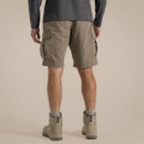 Back view of a male model wearing pebble-coloured NosiLife cargo shorts.