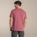 Back view of model wearing a plain red short-sleeve T-shirt.