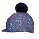 Navy equestrian helmet cover with multicolour firework pattern, peak and black faux fur pom pom, side view.