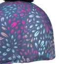 Detailed view of navy riding hat cover panel seam with multicolour firework print on stretch fabric.