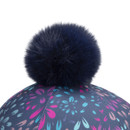 Close-up of black faux fur pom pom on navy firework print riding helmet cover.