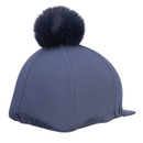 Navy Aubrion riding hat silk with faux fur pom pom, rear three-quarter view with subtle logo on white background.