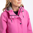 Model wearing a bright pink rain jacket, showing the high collar, hood drawcords and snap-button storm placket.