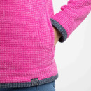 Close-up of the fleece showing the side pocket opening, textured fabric and dark contrast cuff trim.