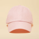 Front view of a pale pink Joules baseball cap on a plain background, featuring a curved brim and tonal stitching.
