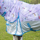 Close-up of the rug’s side showing the lilac unicorn and star print, turquoise piping, silver lower panel, and a “Gallop” surcingle strap.