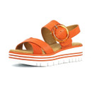 Angled side view of an orange platform sandal with large round buckle and layered white sole with orange stripe detailing.