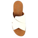 Top-down view of white crossover strap mule sandal on a white background, with tan footbed and wide crossed straps.