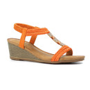 Side view of orange braided T-bar wedge sandal on a white background, showing the embellished centre strap and elasticated slingback.