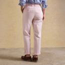Back view of pale pink chinos showing elasticated waistband, belt loops and two back welt pockets.