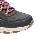 Close-up of the black reinforced toe and cream midsole with pink laces and zebra-print fabric at the tongue.