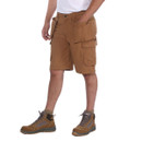 Side view of model wearing brown ripstop cargo shorts showing cargo pocket detail.