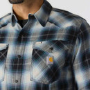 Close-up of the front showing snap-button fastening and flap chest pocket with Carhartt logo patch.