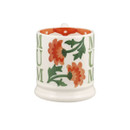 Half-pint ceramic mug featuring orange chrysanthemum flowers and green leaves, shown from the back.