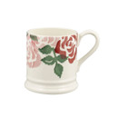 Half-pint ceramic mug with pink and red roses and green leaves, shown on a white background with the handle on the right.