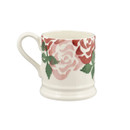 Half-pint ceramic mug with pink and red rose pattern, shown on a white background with the handle on the left.