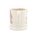 Back view of the mug on a white background, showing the handle centred and pink text around the inner rim.