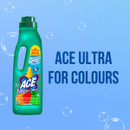 A green bottle of Ace Ultra for Colours detergent is set against a light blue background with floating bubbles. Bold text reads “Ace Ultra for Colours.”