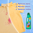 A yellow shirt with a pink stain is shown half cleaned. Text highlights: "Removes stains, Revives colours, Restores clothes." A bottle of ACE detergent is pictured.