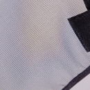 Close-up of fine black mesh fabric on a horse fly mask, showing breathable weave designed to keep insects away from the eyes.