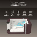 Cutaway illustration of the Lay-Z-Spa Maldives Smart HydroJet Pro 7 inflatable hot tub demonstrating hydrojet massage, airjet bubbles, back and foot massage zones and 40°C heating.