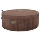 Lay-Z-Spa Toronto inflatable hot tub with insulated cover secured over wood-effect exterior