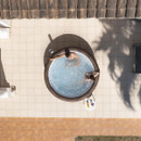 Overhead view of two people relaxing in a Lay-Z-Spa Bali inflatable hot tub.